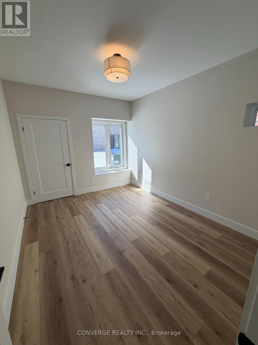 Basement Unit - 10 Sweet Cicely Street, Springwater, Ontario  L9X 2E2 - Photo 5 - S12846348