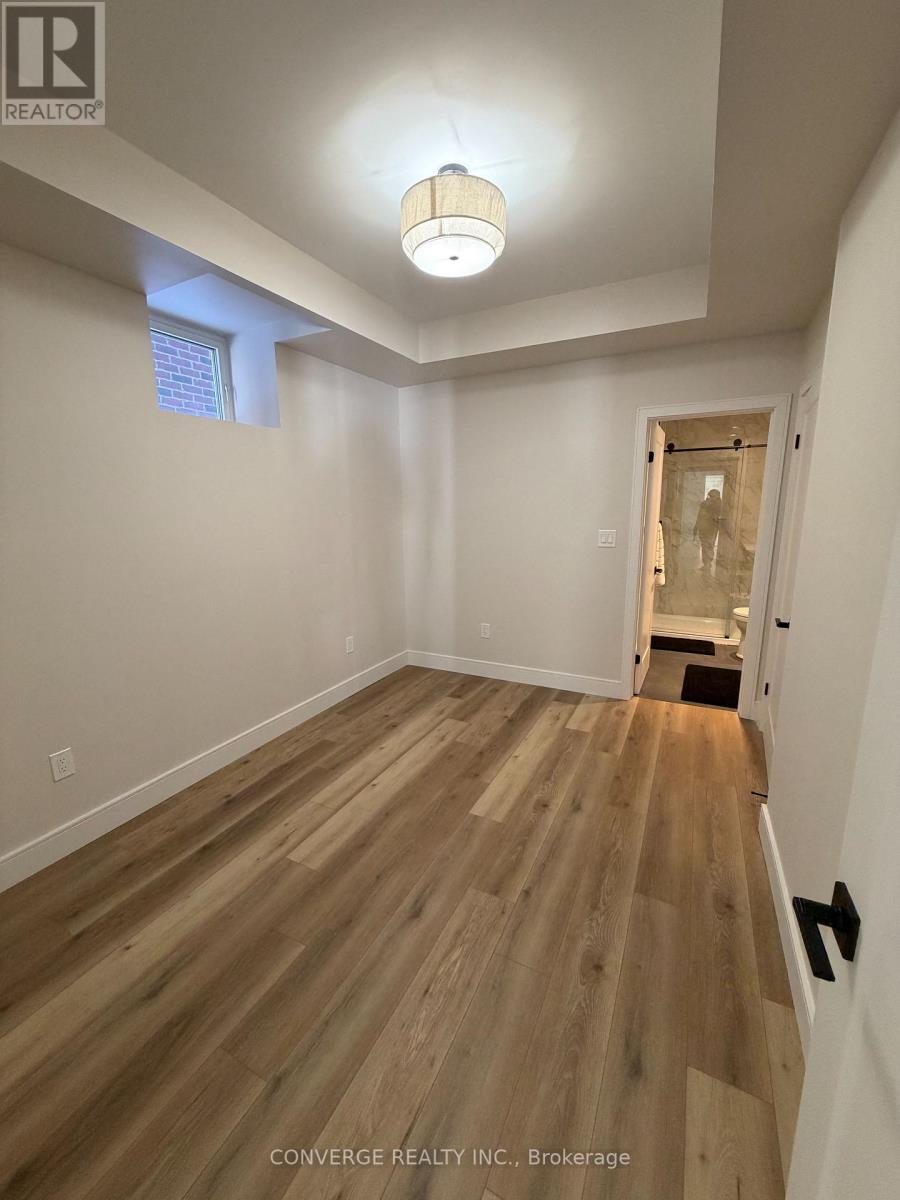 Basement Unit - 10 Sweet Cicely Street, Springwater, Ontario  L9X 2E2 - Photo 7 - S12846348