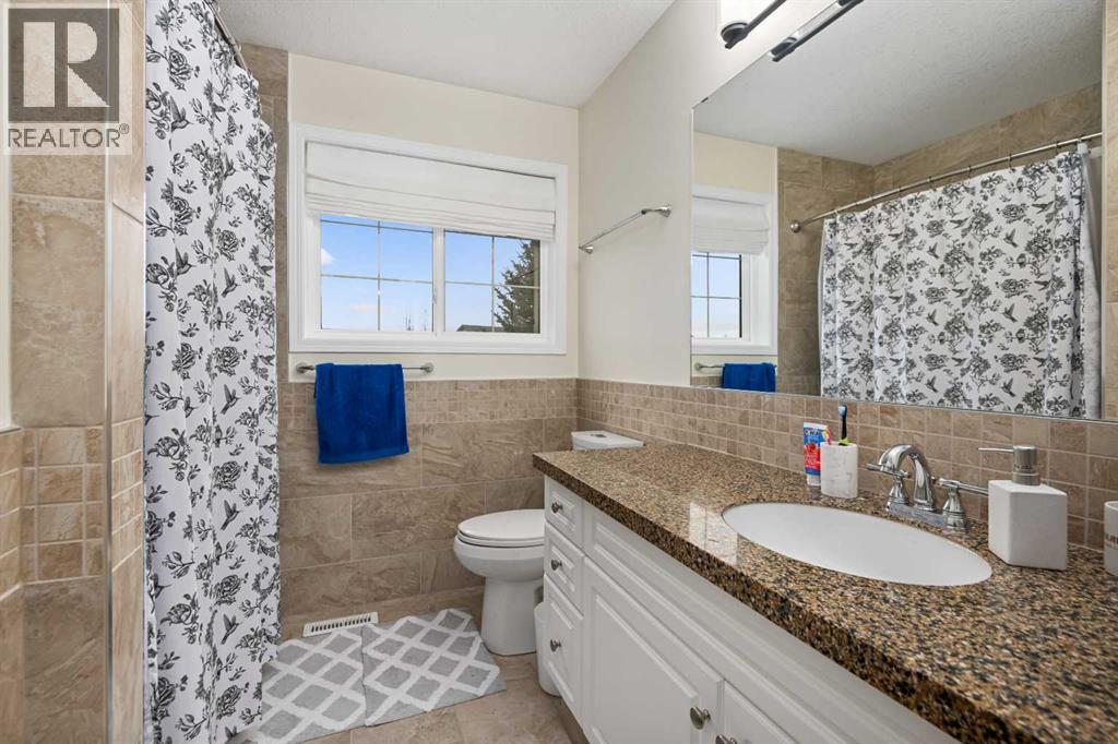 704 Woodside Drive, Airdrie, Alberta  T4B 2G9 - Photo 34 - A2284096