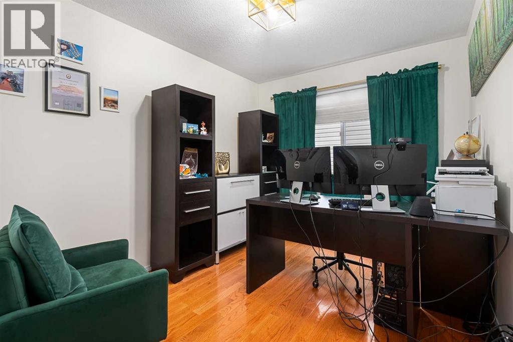 704 Woodside Drive, Airdrie, Alberta  T4B 2G9 - Photo 24 - A2284096