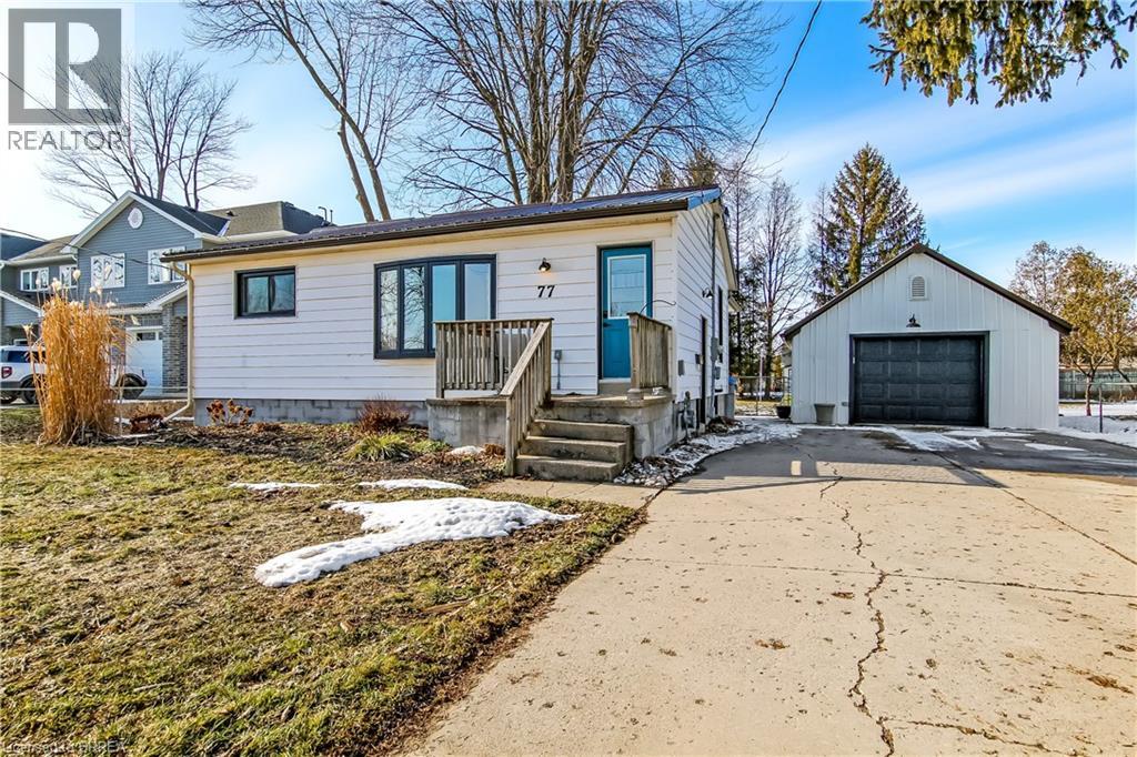 Great opportunity to own this beautifully updated 2-bedroom home situated on a generous 67 x 132 ft fully fenced lot on a quiet dead-end street. Enjoy the perfect blend of privacy and convenience, just minutes to downtown, highway access, and nearby conservation trails. Move-in ready with modern finishes throughout, the main floor features durable laminate flooring and a bright, functional layout. The updated kitchen is sure to impress with quartz countertops, white cabinetry, tiled backsplash, stainless steel appliances, and a high-end stainless range hood.  The spacious primary bedroom includes two double closets plus a large linen closet, while the second bedroom is bright and welcoming. The 4-piece bath offers a newer tub and surround along with excellent storage.  Off the kitchen is a sunroom with in-floor warming that provides a cozy space to relax year-round. Step outside to a northwest-facing deck shaded by a mature maple tree, overlooking the expansive, fully fenced backyard complete with a large garden shed. The detached 1.5-car garage is both heated and insulated—ideal for hobbies, storage, or workshop space. A fantastic property for first-time buyers, downsizers, or anyone seeking a quiet location close to amenities. (id:48254)