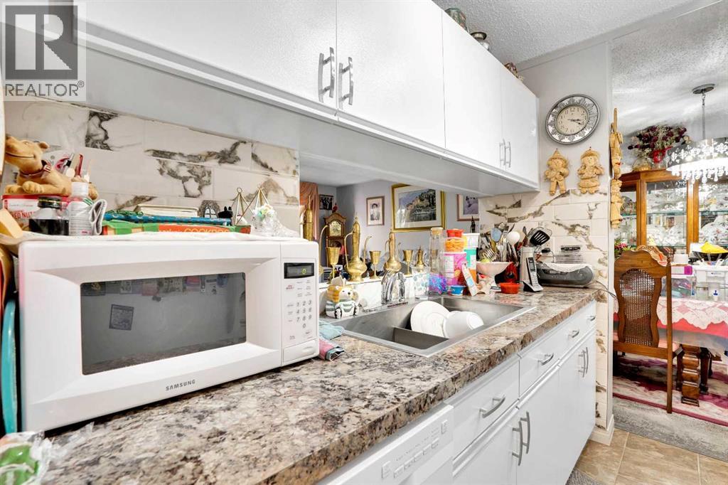 203, 21 Dover Point Se, Calgary, Alberta  T2B 3K4 - Photo 3 - A2288049