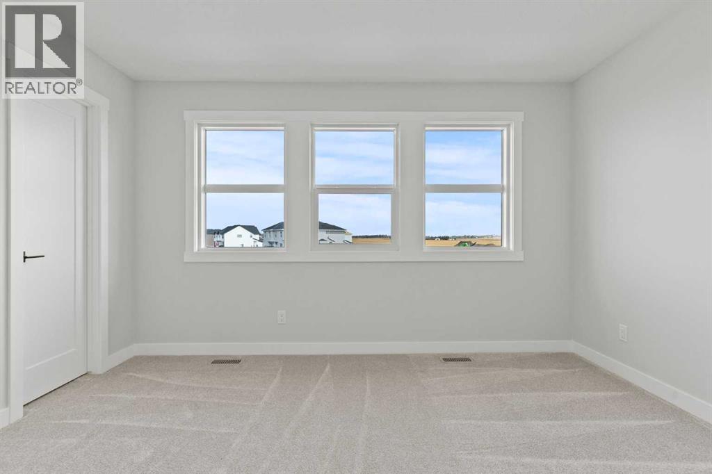 302 Kinniburgh Loop, Chestermere, Alberta  T1X 3C3 - Photo 36 - A2289506