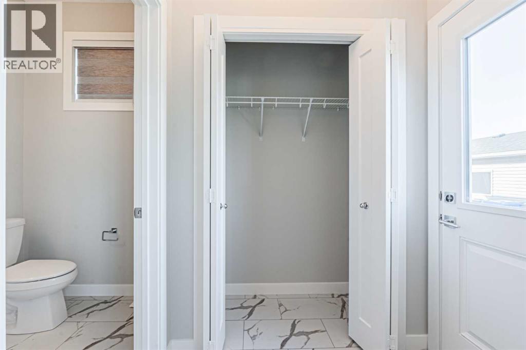 129 Dawson Wharf View, Chestermere, Alberta  T1X 2W3 - Photo 12 - A2282627