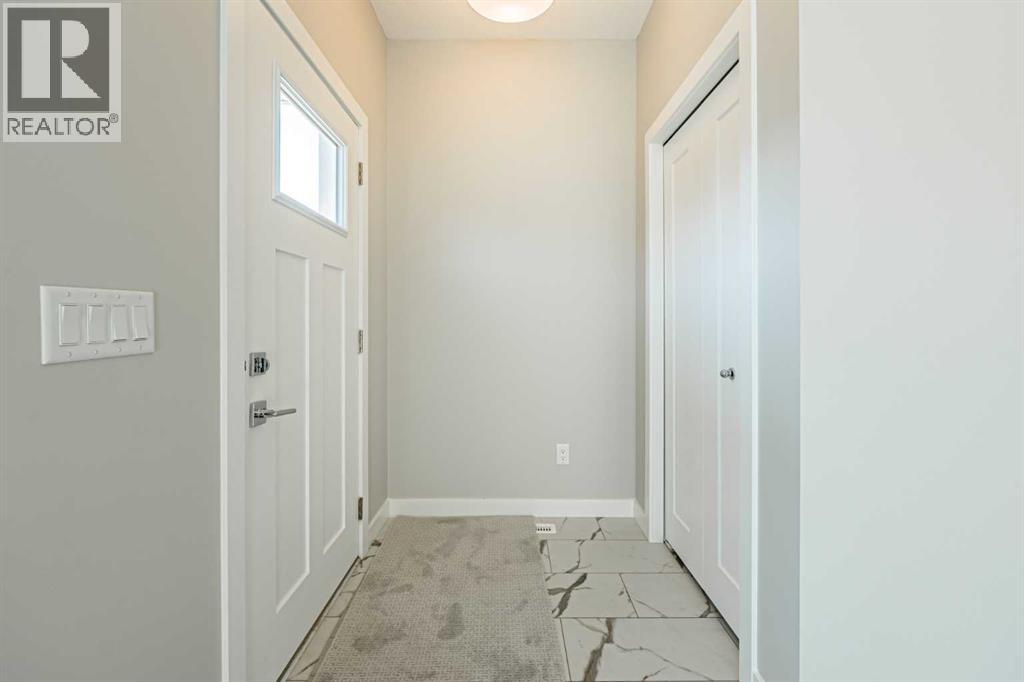 129 Dawson Wharf View, Chestermere, Alberta  T1X 2W3 - Photo 4 - A2282627