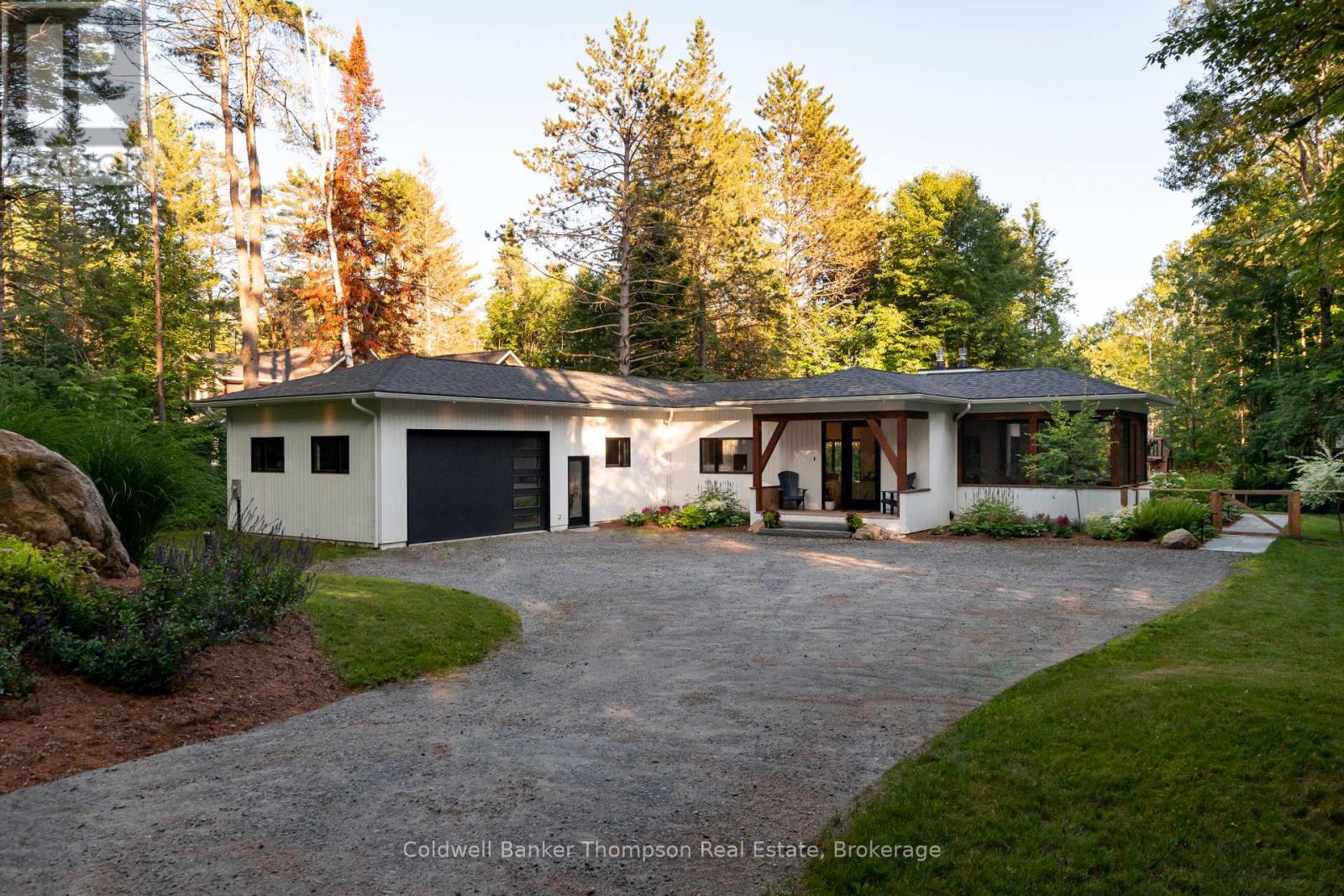 <div class="slider-price">$1,499,900</div><p>105 Spruce Drive, Huntsville, Ontario</p>