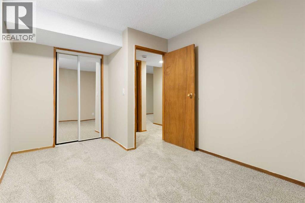 123 Glacier Drive Sw, Calgary, Alberta  T3E 5A3 - Photo 24 - A2288194