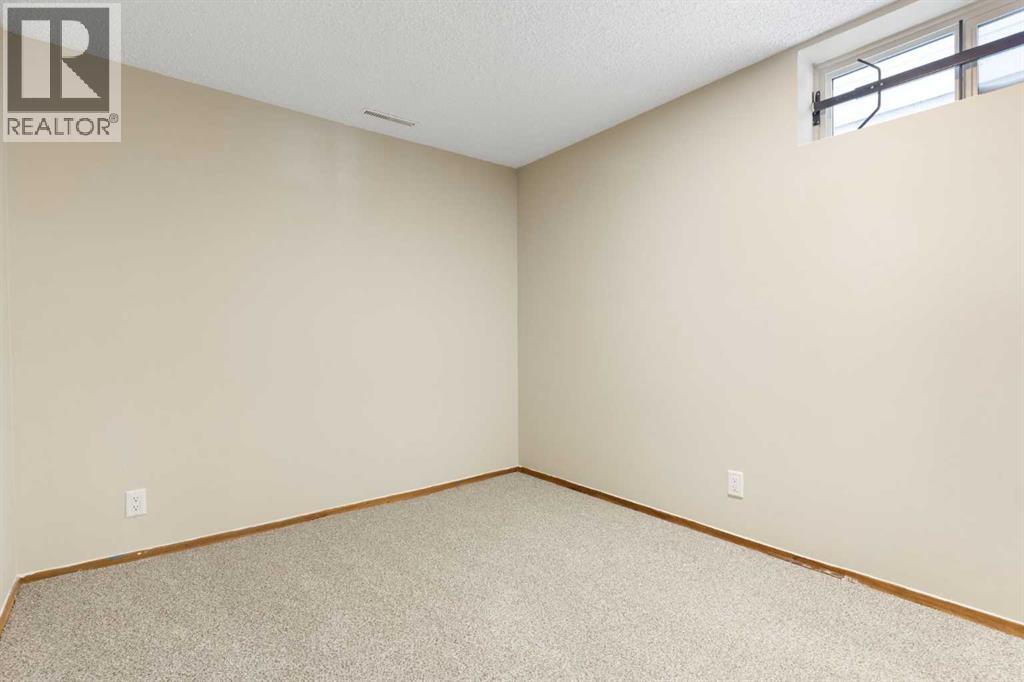 123 Glacier Drive Sw, Calgary, Alberta  T3E 5A3 - Photo 23 - A2288194