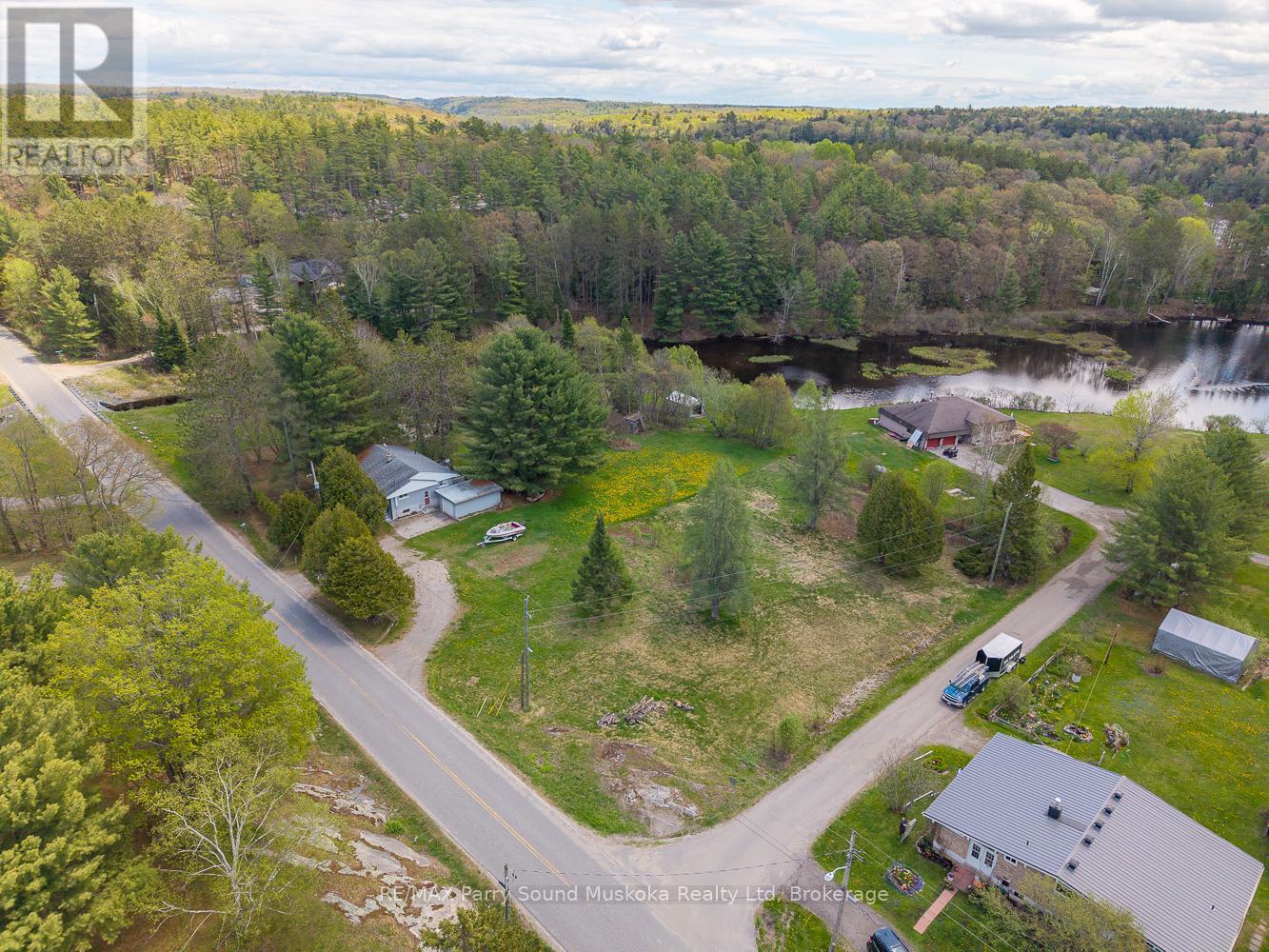 63 Pineridge Drive, Mcdougall, Ontario  P2A 2W9 - Photo 4 - X12847764