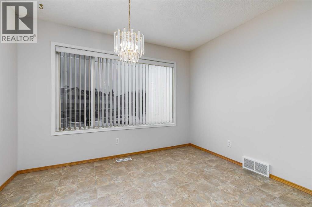 153 Rocky Ridge Court Nw, Calgary, Alberta  T3G 4S7 - Photo 12 - A2287379