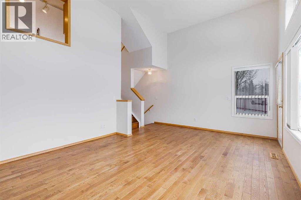 153 Rocky Ridge Court Nw, Calgary, Alberta  T3G 4S7 - Photo 8 - A2287379