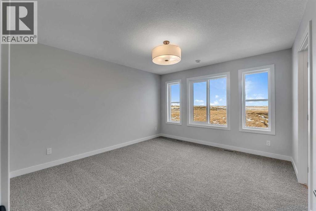 1172 Iron Ridge Avenue, Crossfield, Alberta  T0M 0S0 - Photo 18 - A2268768