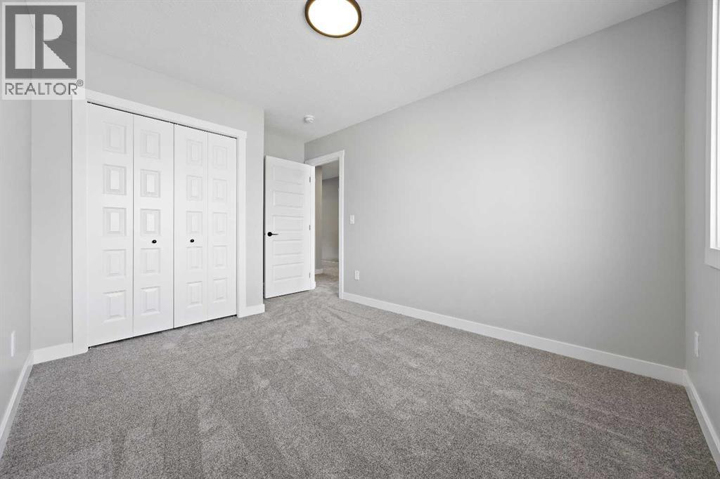 1414 Bayview Crescent Sw, Airdrie, Alberta  T4B 5N9 - Photo 33 - A2267299