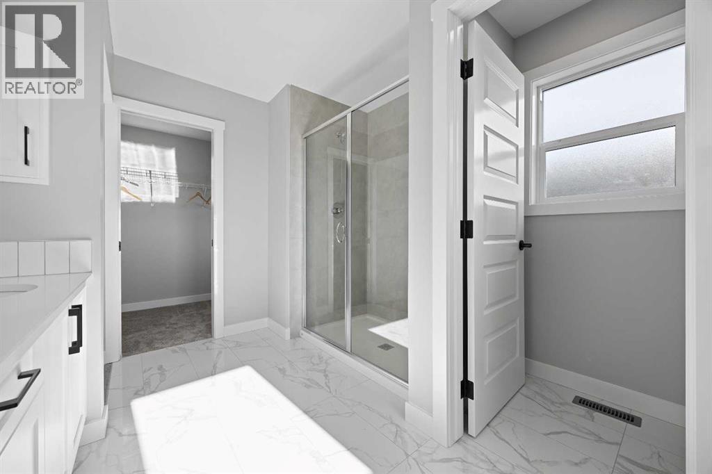 1414 Bayview Crescent Sw, Airdrie, Alberta  T4B 5N9 - Photo 30 - A2267299