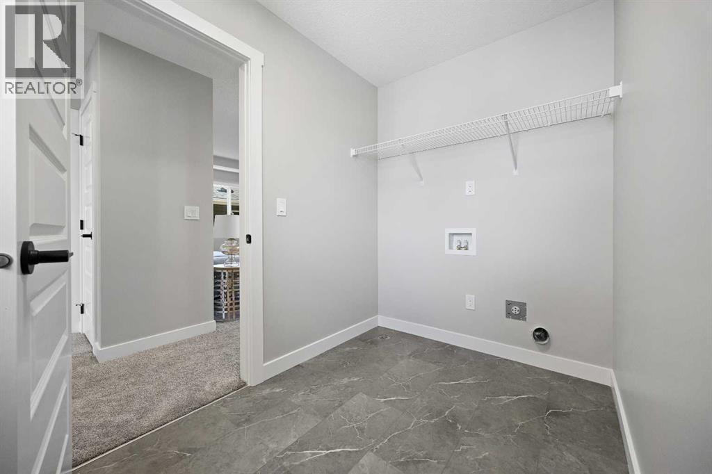 1414 Bayview Crescent Sw, Airdrie, Alberta  T4B 5N9 - Photo 37 - A2267299