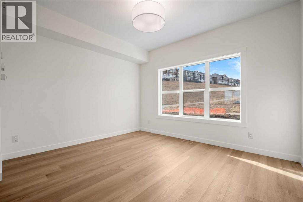 1804, 525 River Heights Drive, Cochrane, Alberta  T4C 3E4 - Photo 3 - A2286055