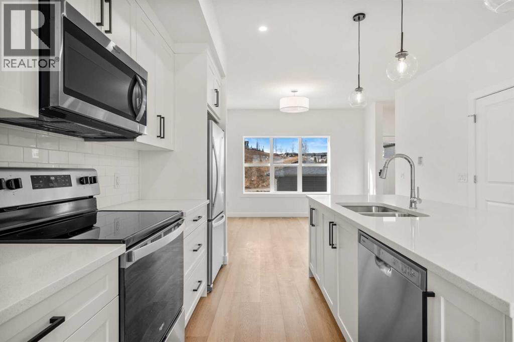 1804, 525 River Heights Drive, Cochrane, Alberta  T4C 3E4 - Photo 9 - A2286055