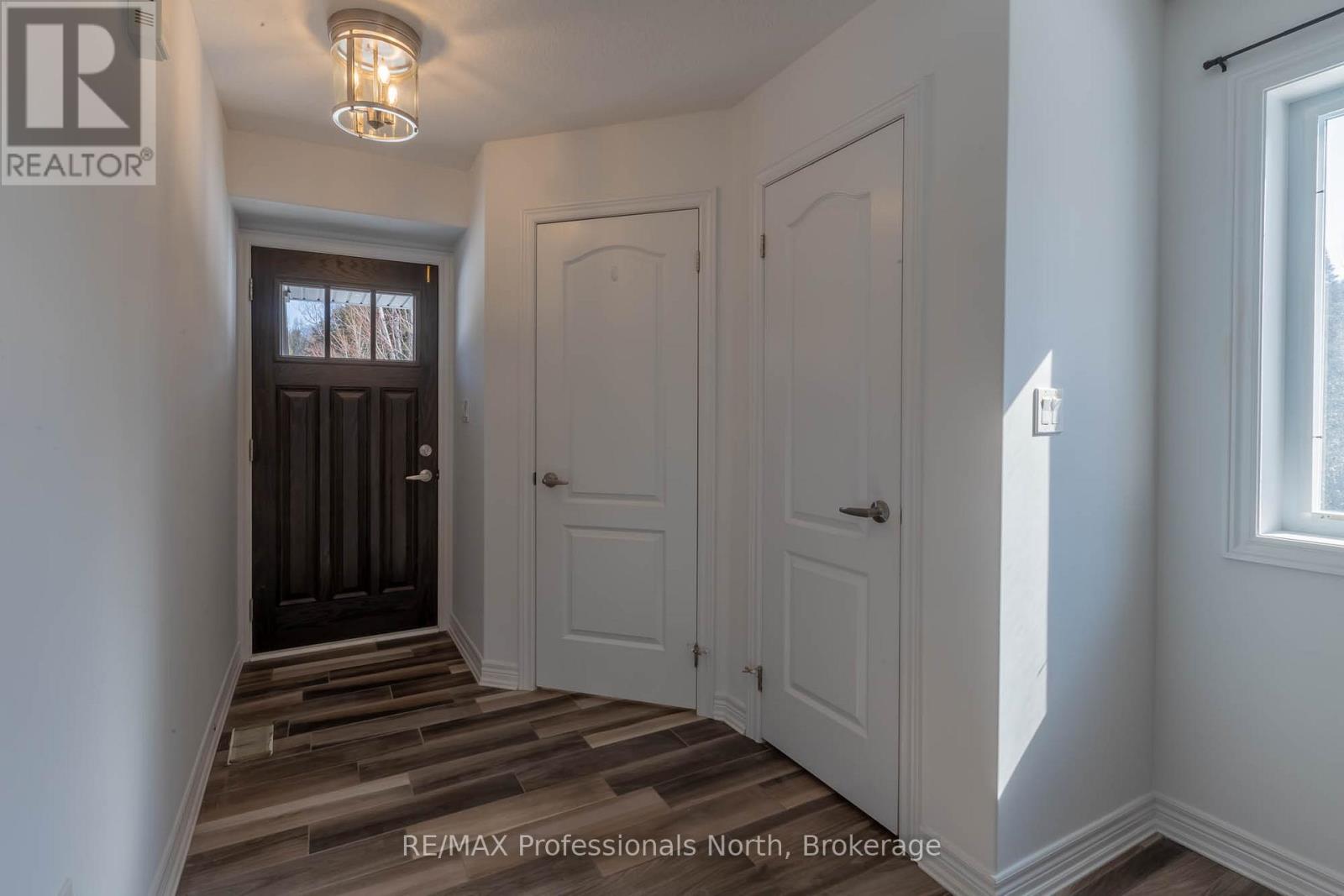 13 Brookside Crossing, Huntsville (Chaffey), Ontario  P1H 1C9 - Photo 5 - X12849626