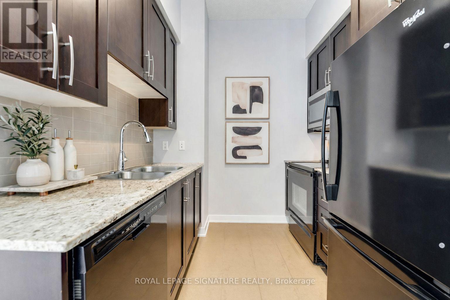 311 - 4070 Confederation Parkway, Mississauga, Ontario  L5B 0E9 - Photo 3 - W12843494