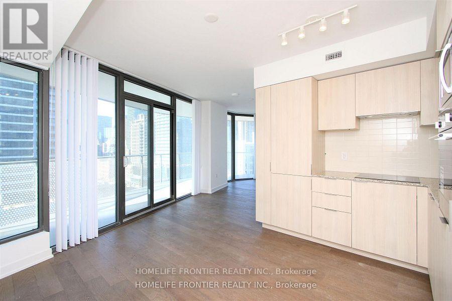 1011 - 11 Wellesley Street W, Toronto (Bay Street Corridor), Ontario  M4Y 1E8 - Photo 3 - C12849774