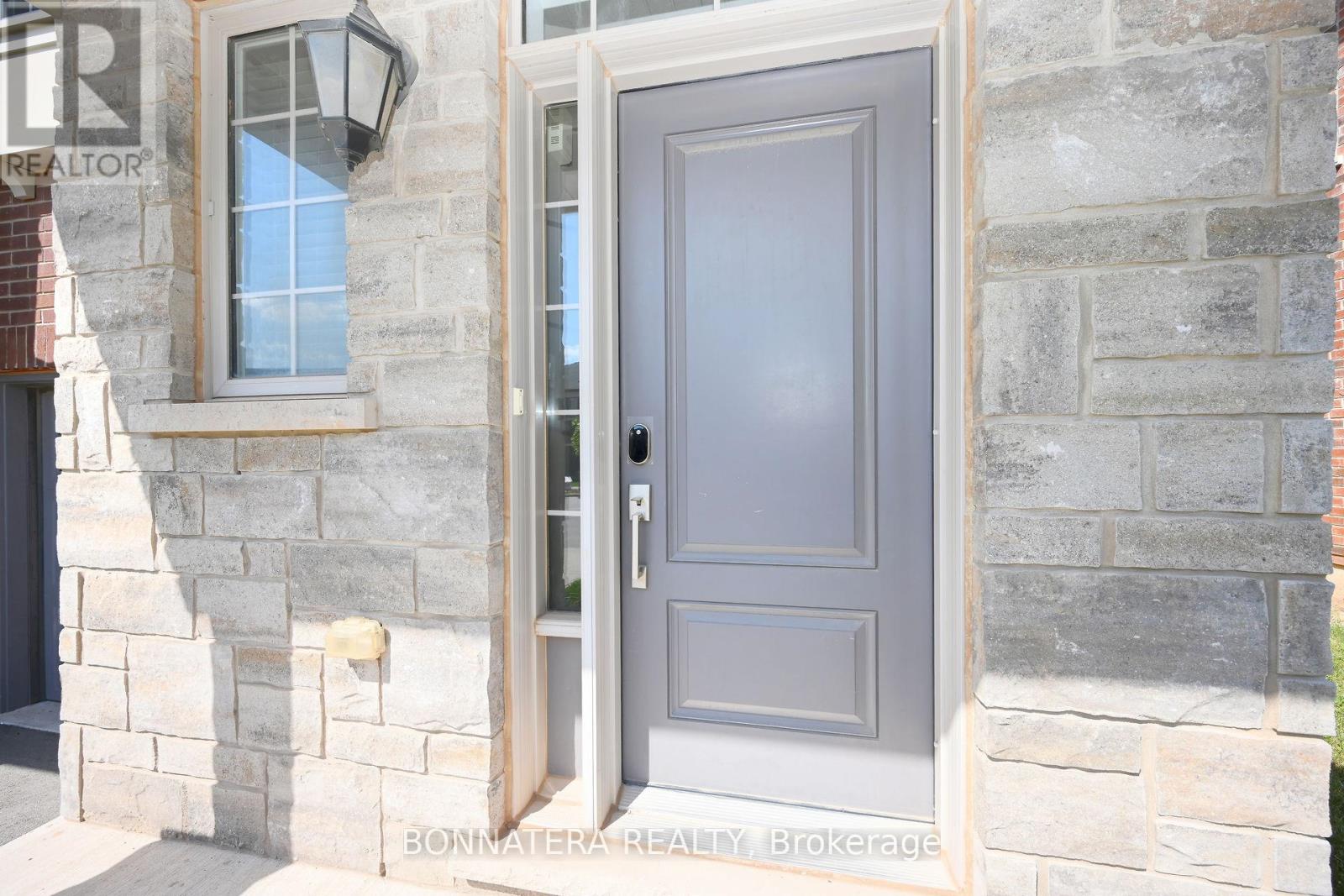 387 Wheat Boom Drive, Oakville, Ontario  L6H 7C2 - Photo 4 - W12850240