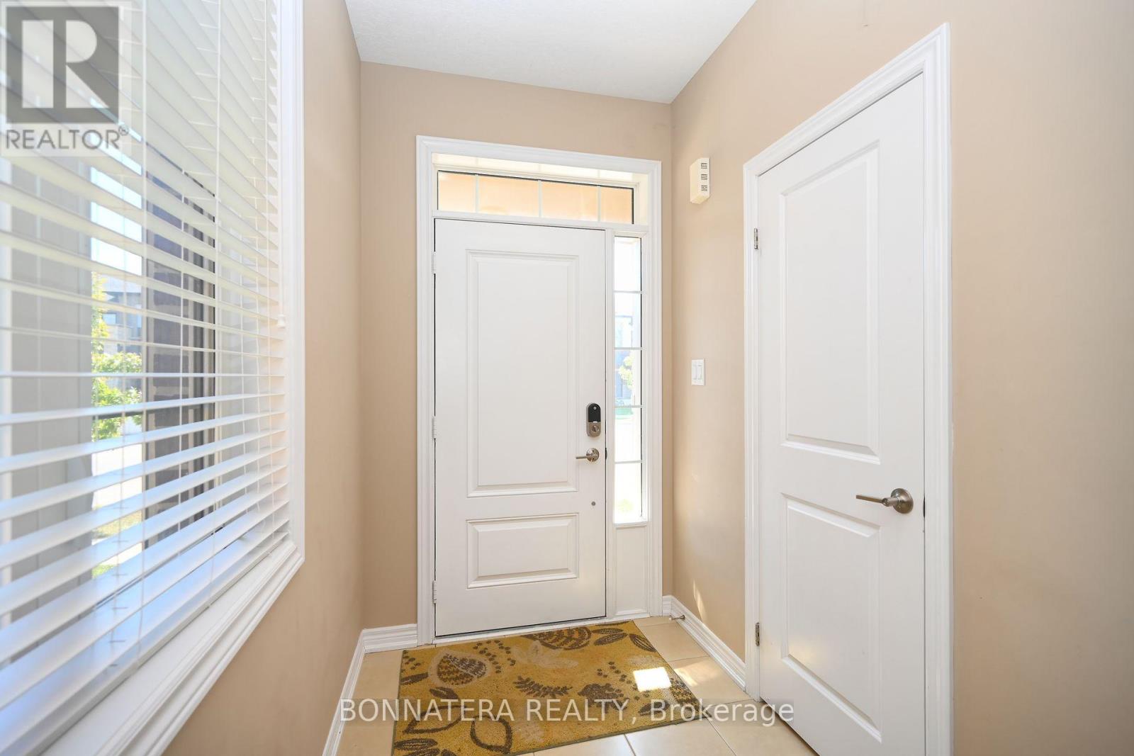 387 Wheat Boom Drive, Oakville, Ontario  L6H 7C2 - Photo 8 - W12850240