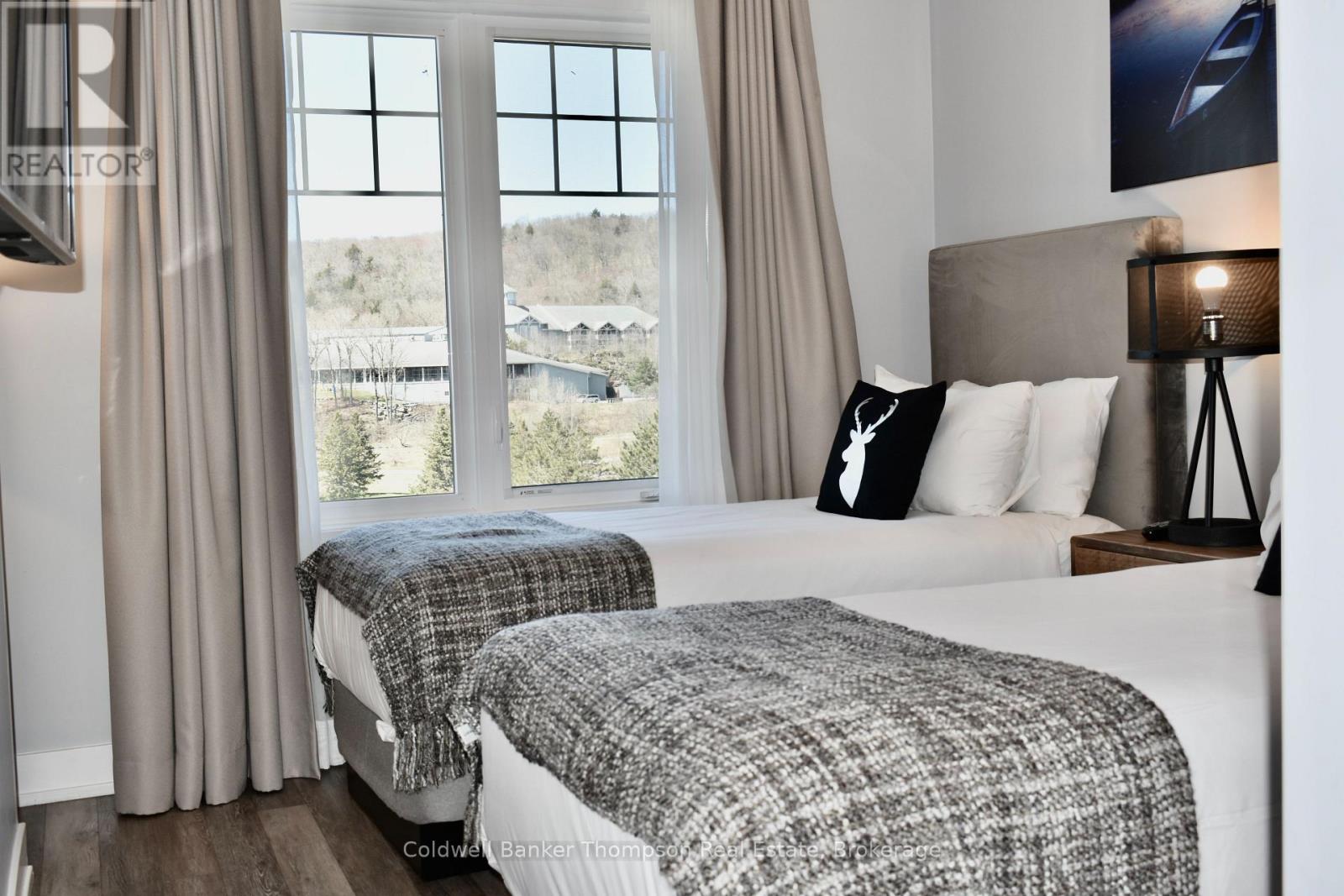 404 - 25 Pen Lake Point Road, Huntsville, Ontario  P1H 1A9 - Photo 25 - X12850428