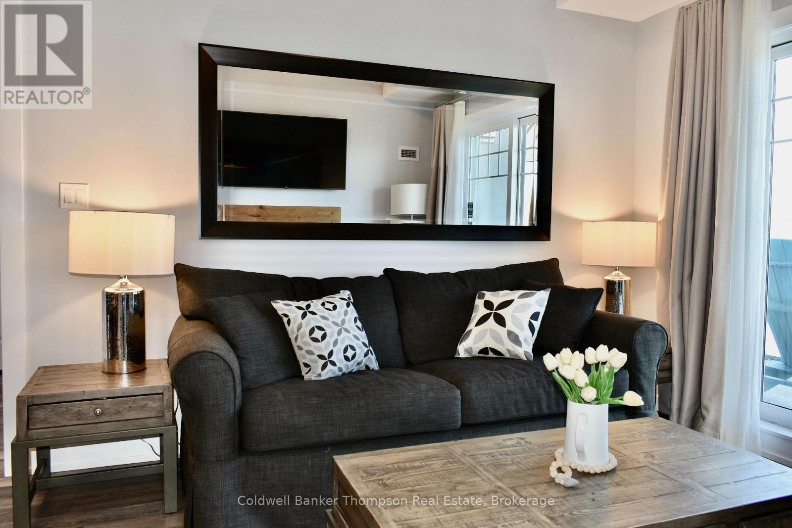 404 - 25 Pen Lake Point Road, Huntsville, Ontario  P1H 1A9 - Photo 3 - X12850428