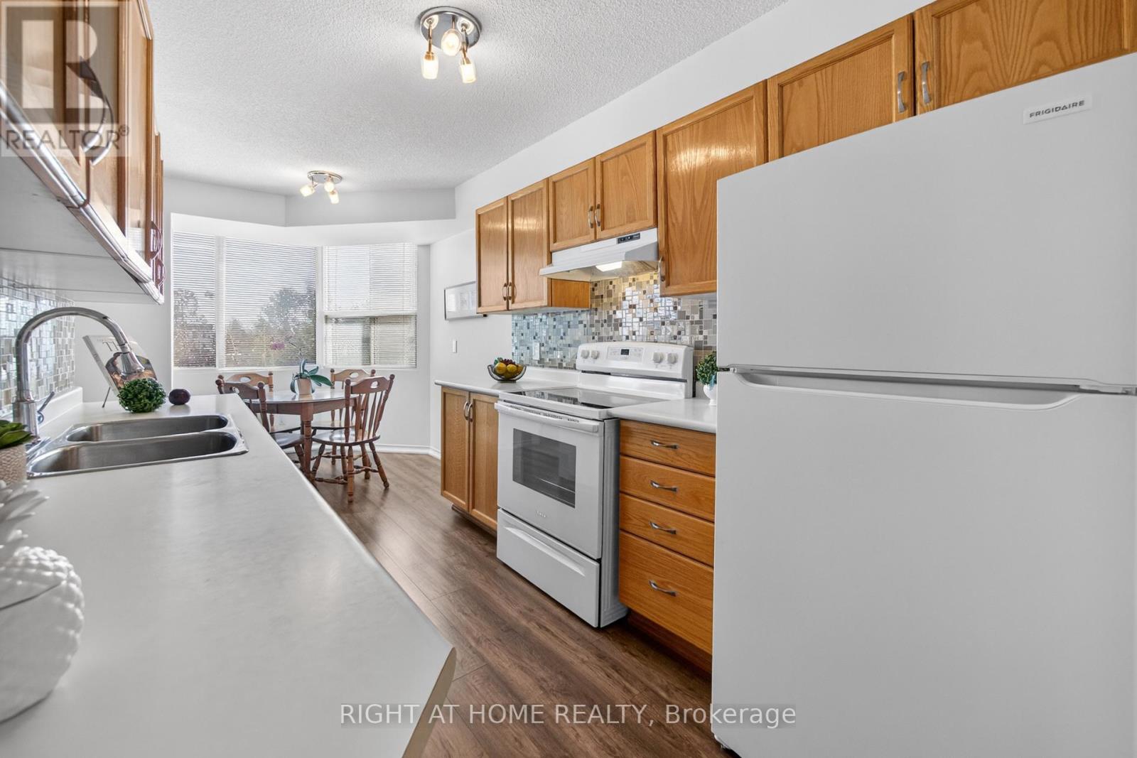 210 - 100 Millside Drive, Milton, Ontario  L9T 5E2 - Photo 24 - W12850458