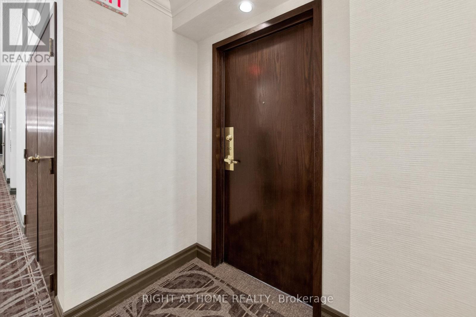 210 - 100 Millside Drive, Milton, Ontario  L9T 5E2 - Photo 5 - W12850458