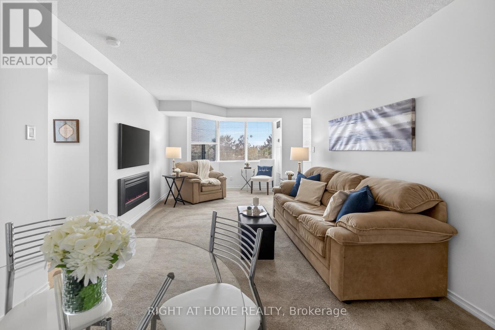 210 - 100 Millside Drive, Milton, Ontario  L9T 5E2 - Photo 7 - W12850458