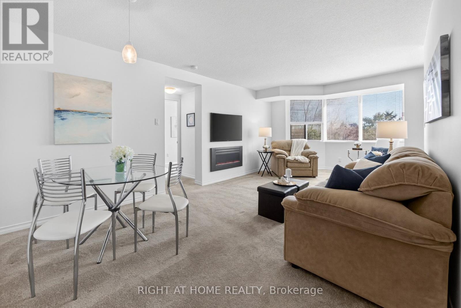 210 - 100 Millside Drive, Milton, Ontario  L9T 5E2 - Photo 8 - W12850458