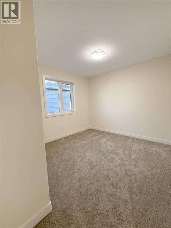 951 41 Avenue N, Lethbridge, Alberta  T1H 7G9 - Photo 18 - A2278259