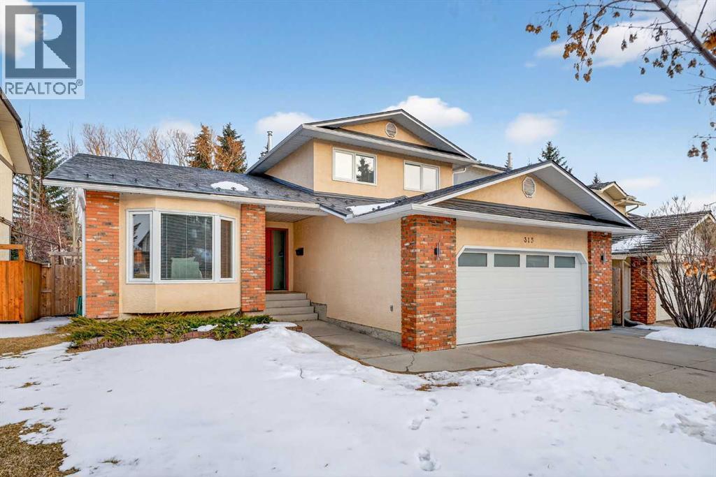 315 Woodhaven Place Sw, Calgary, Alberta  T2W 5P4 - Photo 3 - A2289181