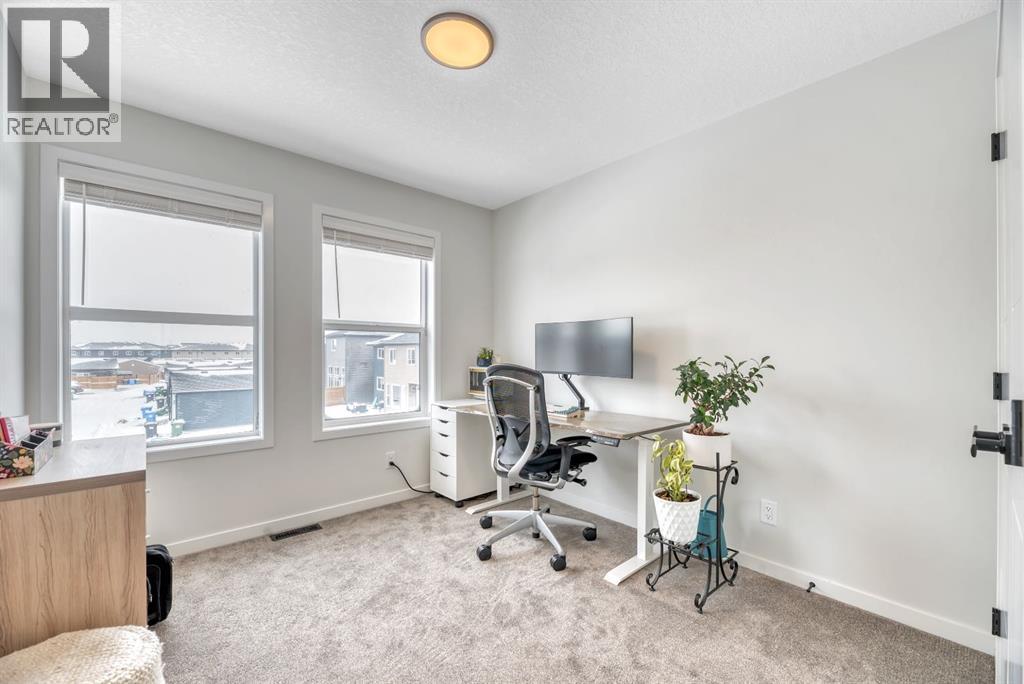 559 Wolf Creek Way Se, Calgary, Alberta  T2X 4Y9 - Photo 28 - A2289317