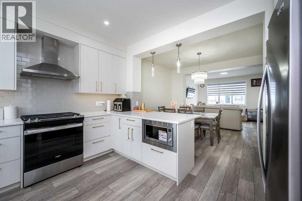 358 Chelsea Hollow, Chestermere, Alberta  T1X 2T3 - Photo 9 - A2289601