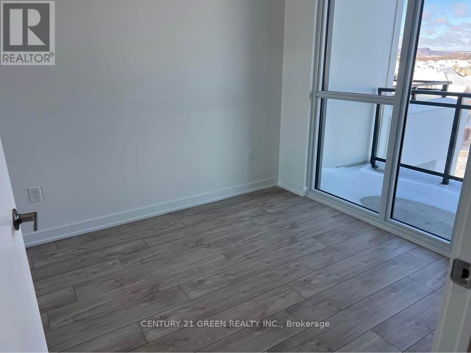 402 - 770 Whitlock Avenue, Milton, Ontario  L9E 2B2 - Photo 4 - W12851318