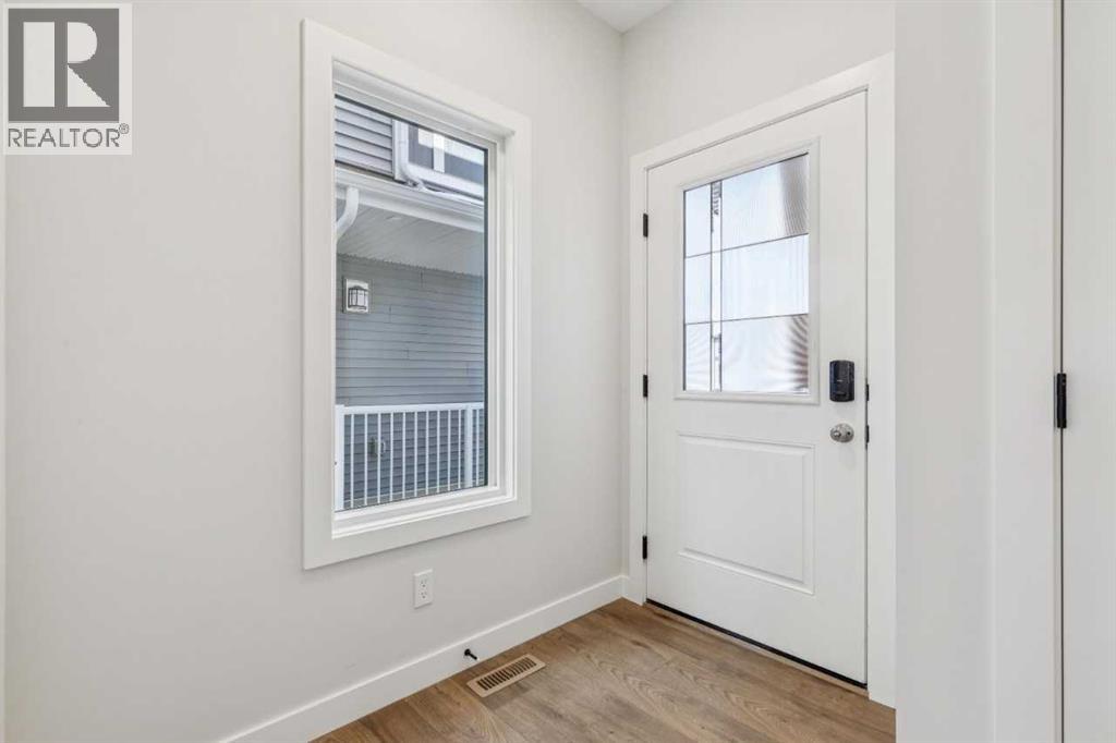 124 Southbow Village Way, Cochrane, Alberta  T4C 3J9 - Photo 3 - A2283420