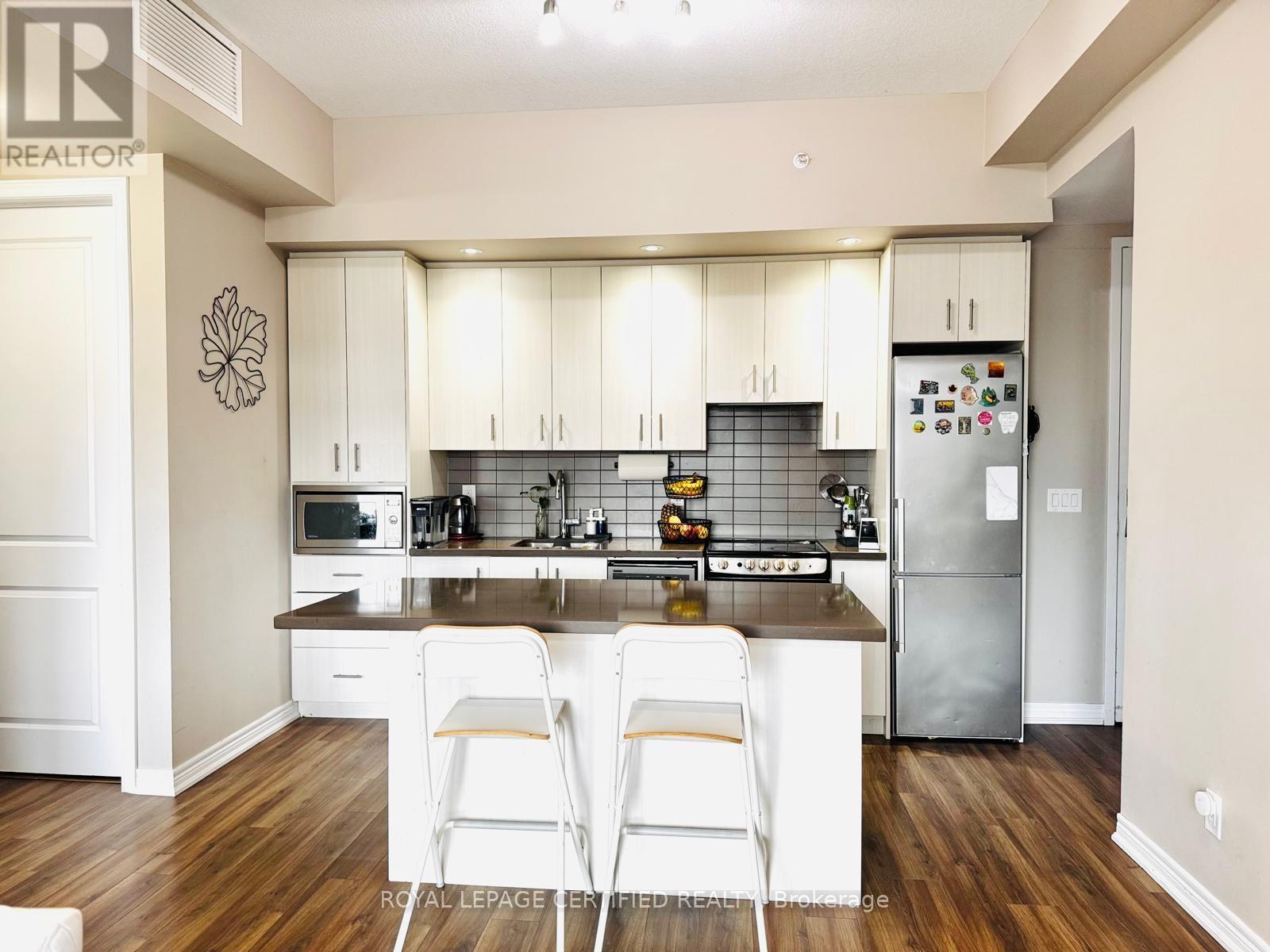 402 - 457 Plains Rd E, Burlington, Ontario  L7T 0B8 - Photo 7 - W12851416