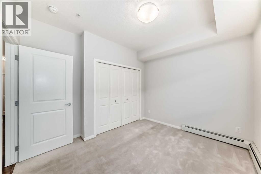 104, 360 Harvest Hills Common Ne, Calgary, Alberta  T3K 2N1 - Photo 24 - A2283549