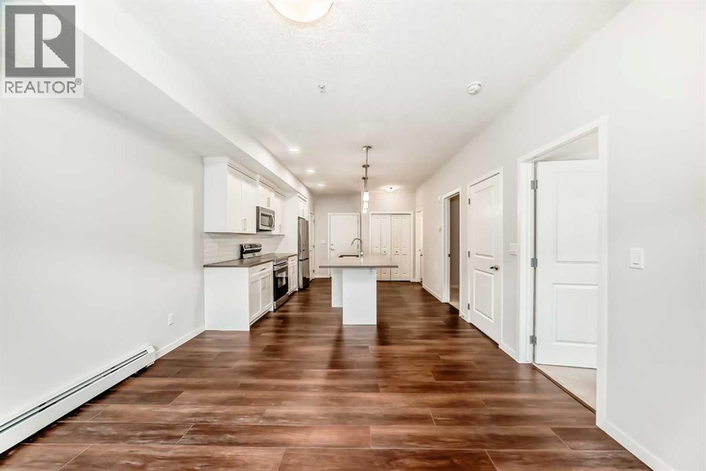 104, 360 Harvest Hills Common Ne, Calgary, Alberta  T3K 2N1 - Photo 18 - A2283549