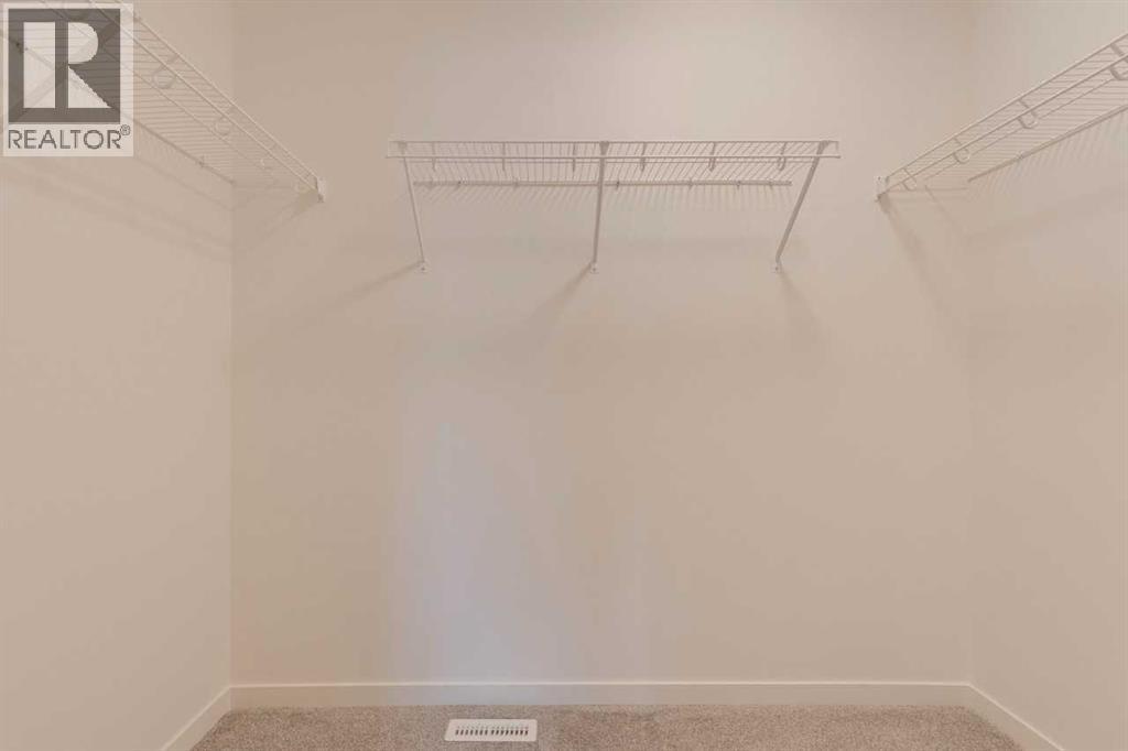 1402 Bayview Crescent Sw, Airdrie, Alberta  T4B 5N9 - Photo 26 - A2275452