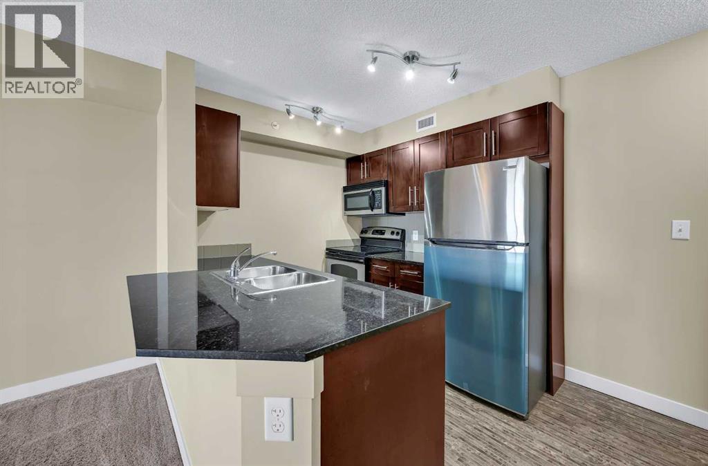 414, 7180 80 Avenue Ne, Calgary, Alberta  T3J 0N6 - Photo 4 - A2282354