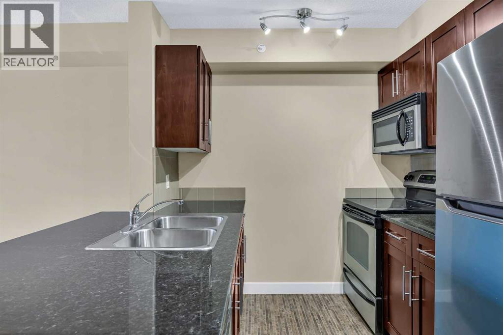 414, 7180 80 Avenue Ne, Calgary, Alberta  T3J 0N6 - Photo 6 - A2282354