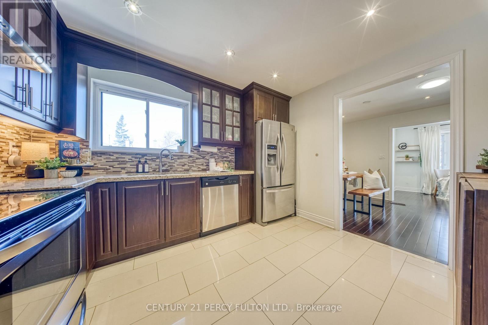 23 Wellesworth Drive, Toronto, Ontario  M9C 4P5 - Photo 8 - W12852186