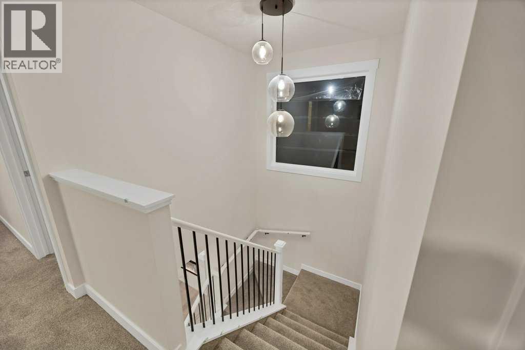 7 Chelsea Port Link, Chestermere, Alberta  T1X 3H4 - Photo 19 - A2280523