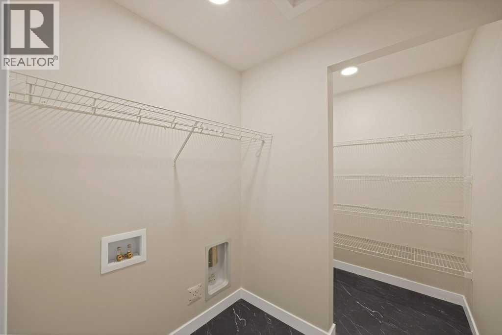 7 Chelsea Port Link, Chestermere, Alberta  T1X 3H4 - Photo 28 - A2280523