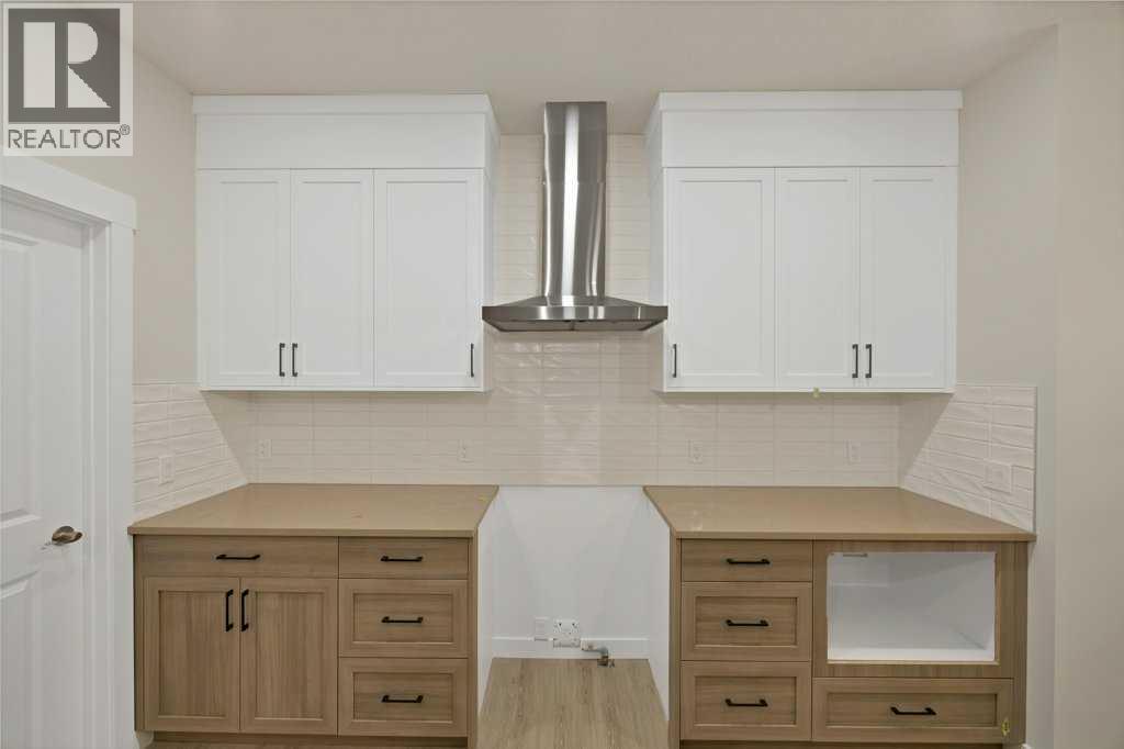 7 Chelsea Port Link, Chestermere, Alberta  T1X 3H4 - Photo 9 - A2280523