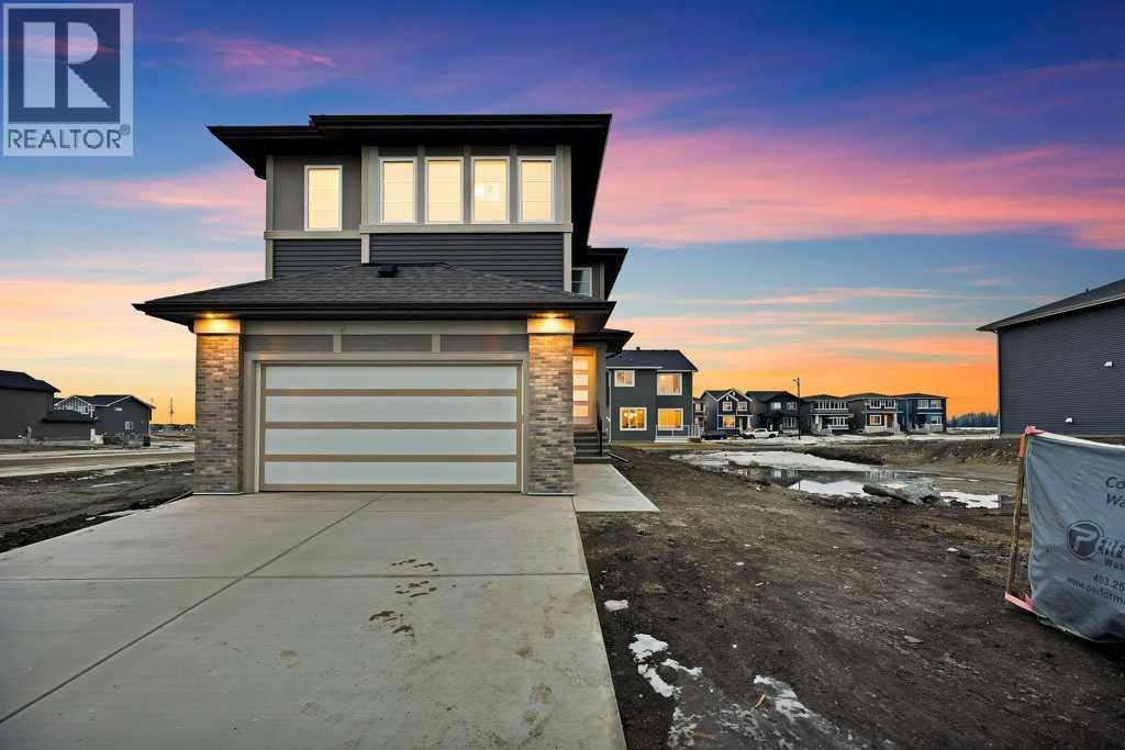 7 Chelsea Port Link, Chestermere, Alberta  T1X 3H4 - Photo 1 - A2280523