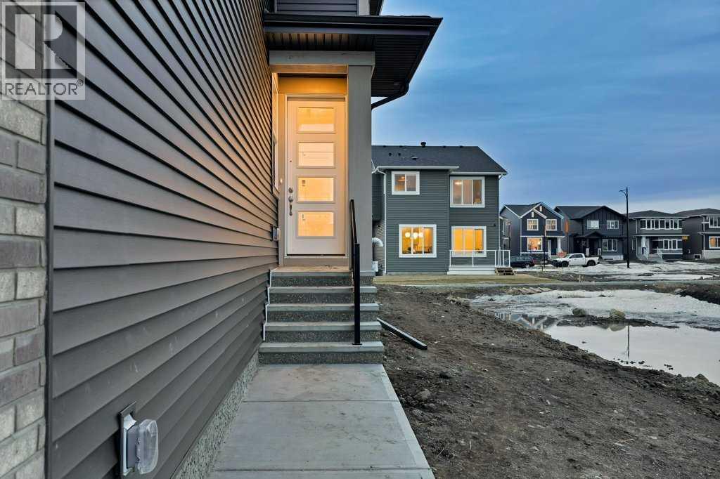 7 Chelsea Port Link, Chestermere, Alberta  T1X 3H4 - Photo 2 - A2280523